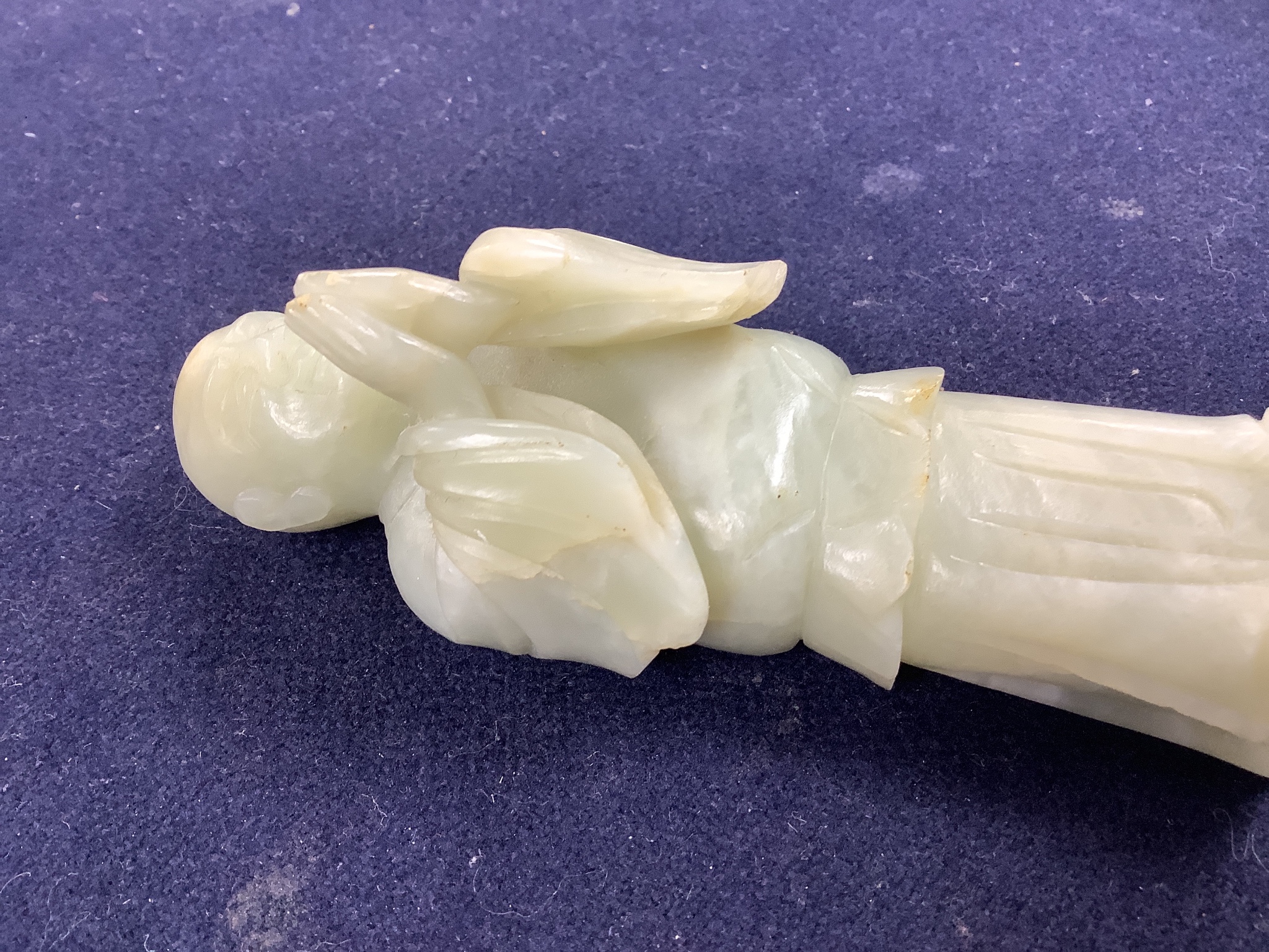 A Chinese celadon jade figure of a priest